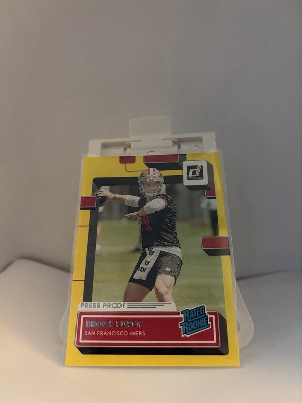 2022 Panini Donruss Rated Rookie Brock Purdy #374 Press Proof Yellow (RC)