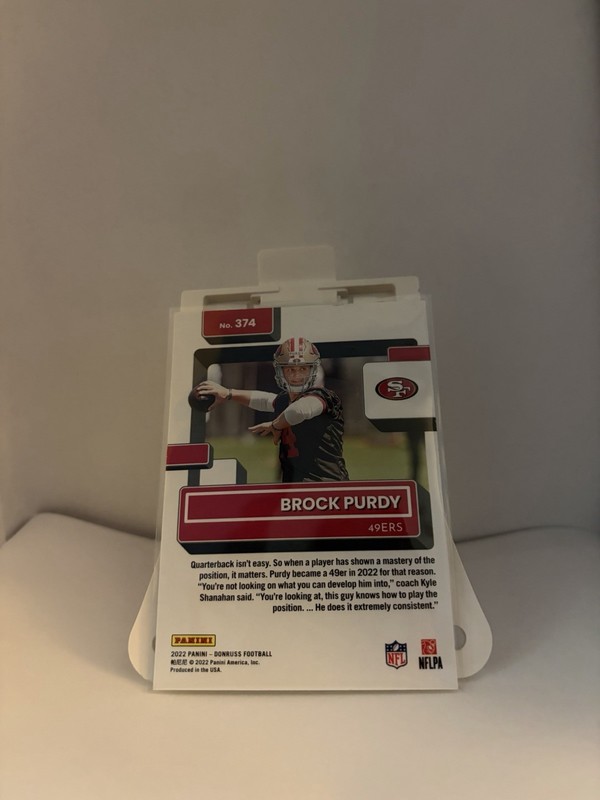 2022 Panini Donruss Rated Rookie Brock Purdy #374 Press Proof Yellow (RC) view 2