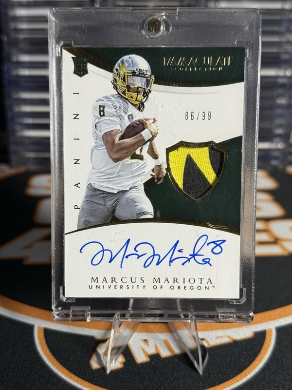 2015 Immaculate Multi-Sport Marcus Mariota Rookie RC Jersey Auto /99 #302 view 2