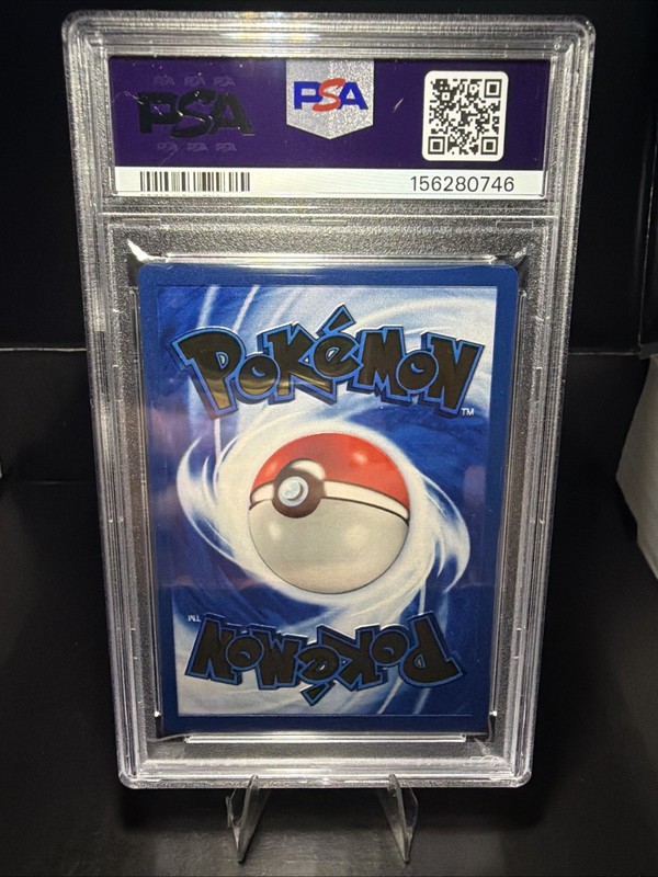 PSA 8 Charizard (Celebrations Metal Card) 4/102 Holo Celebrations UPC view 2