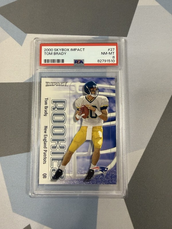 Fleer/SkyBox 2000 SkyBox Impact Rookies Tom Brady RC #27 PSA 8 Patriots