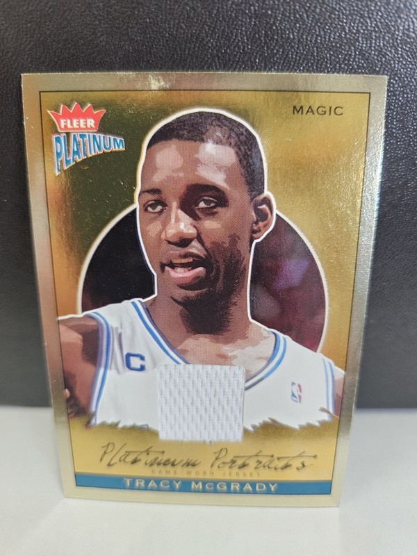 (SEE PICS) 2003-04 Fleer Platinum Tracy McGrady Game Used Jersey Card Magic 
