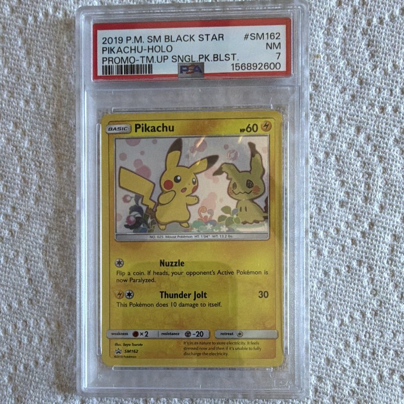 The Pokemon Company Pikachu SM162 SM Black Star Promo Holo English PSA 7