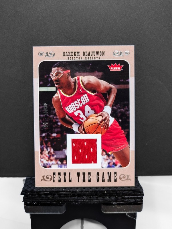 HAKEEM OLAJUWON 2007-08 NBA Fleer Feel the Game GAME USED MEM PATCH ROCKETS HOF
