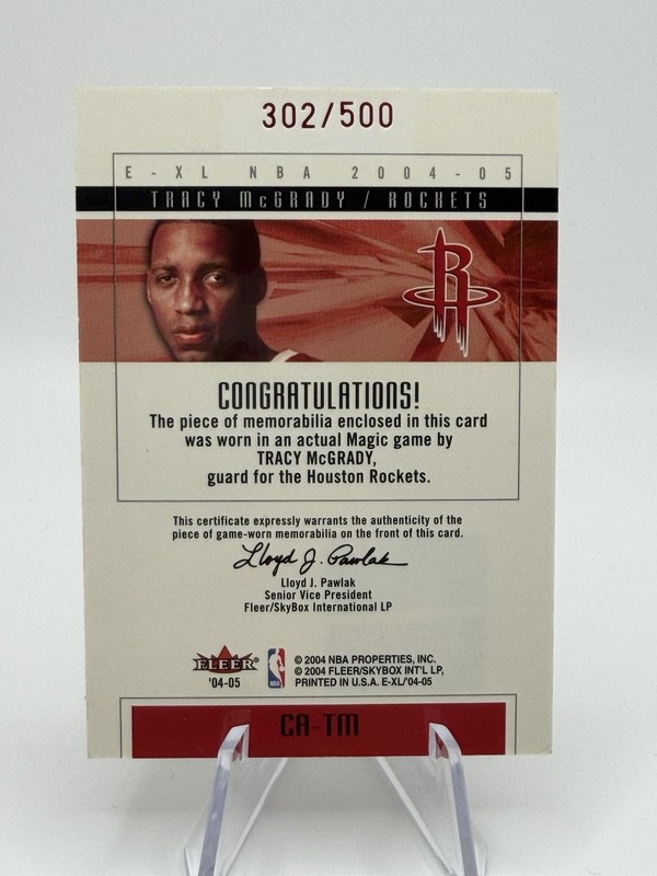 2004-05 Fleer E-XL Tracy McGrady Court Authentics Game Used Jersey #/500 view 2