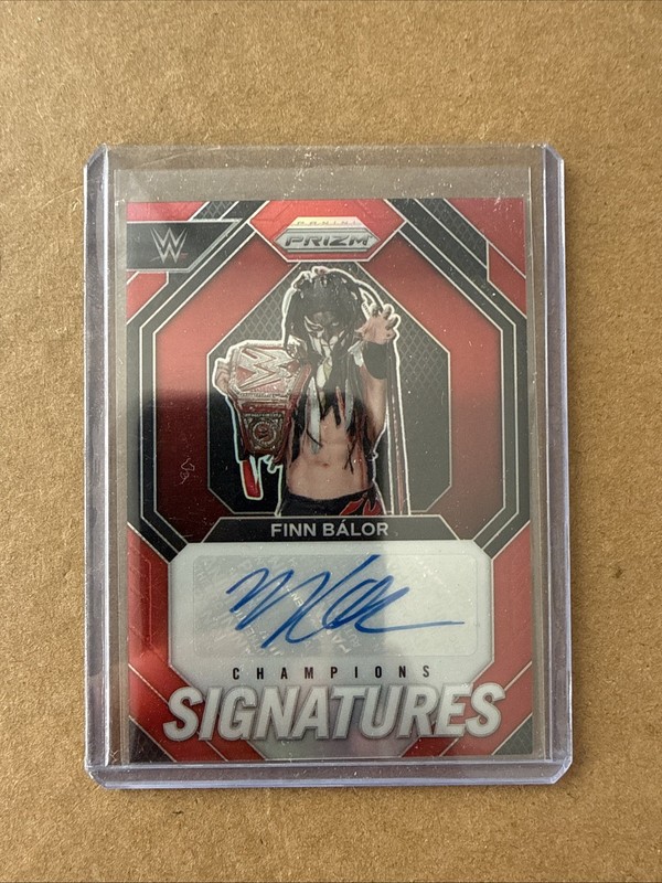 2024 Panini Prizm WWE Finn Balor Champions Signatures Red Auto #52/99
