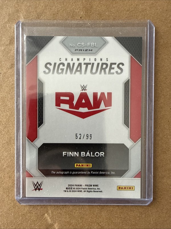2024 Panini Prizm WWE Finn Balor Champions Signatures Red Auto #52/99 view 2