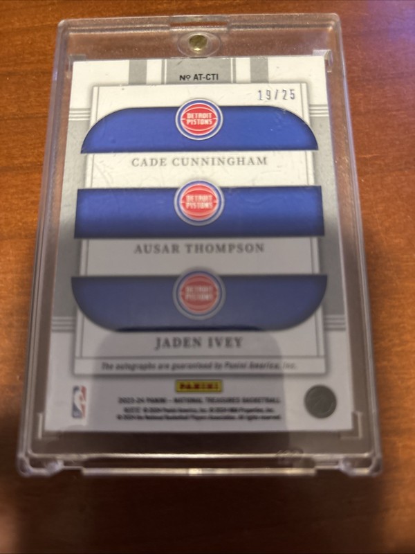 2023 National Treasures Triple Auto - Cade Cunningham, A. Thompson, J. Ivey /25 view 2