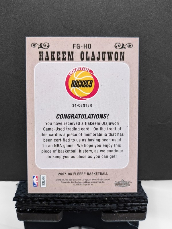 Hakeem Olajuwon 2007-08 Fleer Feel The Game Game Used Jersey/Patch Rockets SSP view 2