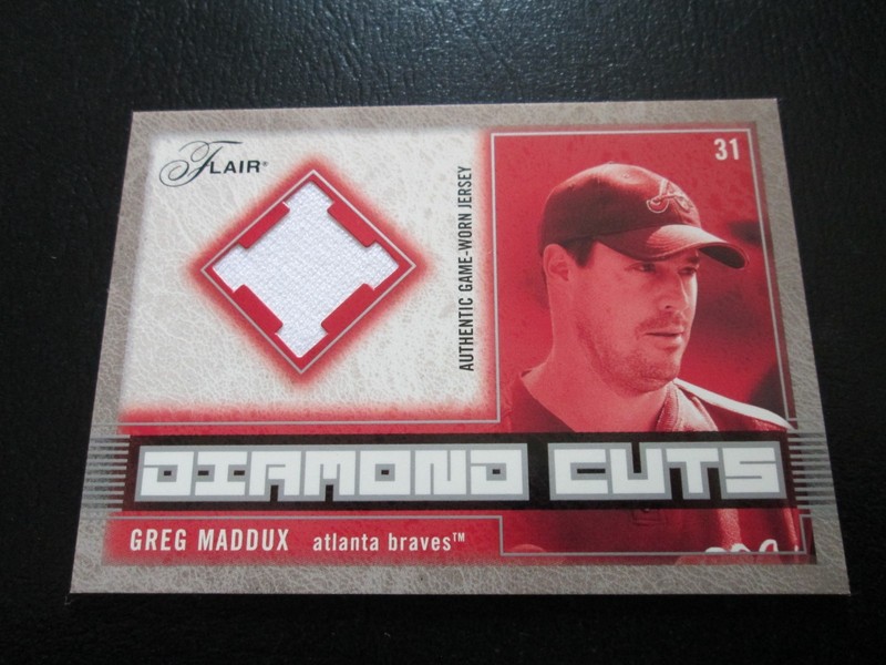 GREG MADDUX 2003 FLAIR DIAMOND CUTS AUTHENTIC GAME WORN JERSEY CARD #DC-GM