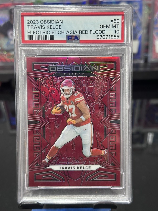2023 Panini Obsidian Equinox Travis Kelce Asia Red Flood Electric /99 PSA 10 view 1