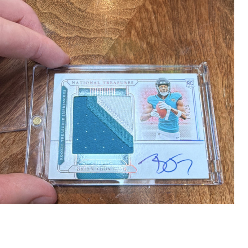 Panini National Treasures Brian Thomas Jr. RTI-BTJ Patch Auto Jaguars rc 14/25