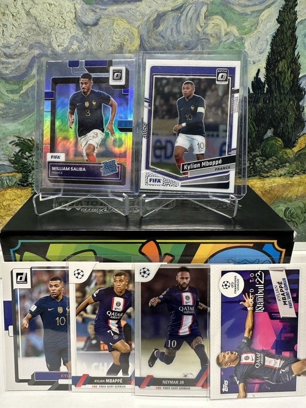 2023-24 Panini Donruss Kylian Mbappe Optic #17 France Rated Rookie Holo Saliba