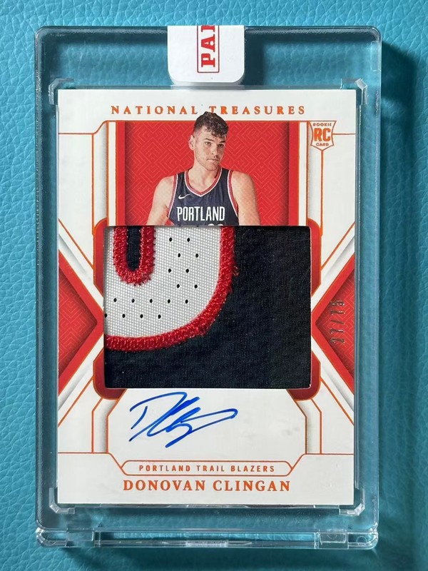 Donovan Clingan 2024-25 Panini National Treasures 27/75 Patch Auto Orange RC