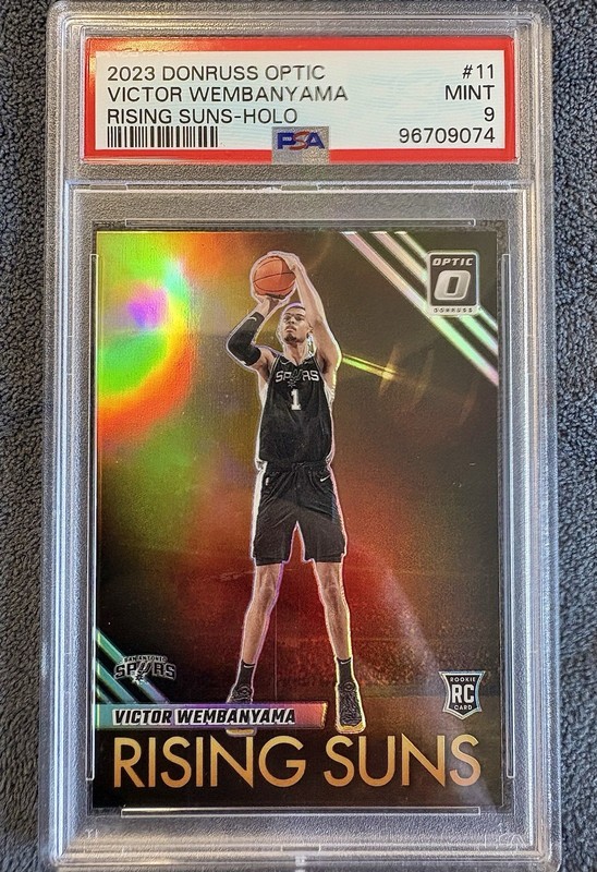 2023-24 Donruss Optic Rising Suns Hologram Victor Wembanyama Rookie #11 PSA 9