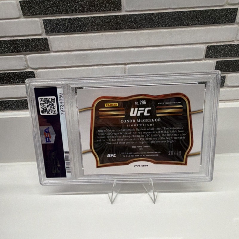 Panini 2023 Select UFC Octagonside Conor McGregor #296 Blue Disco /49 PSA 10 view 2