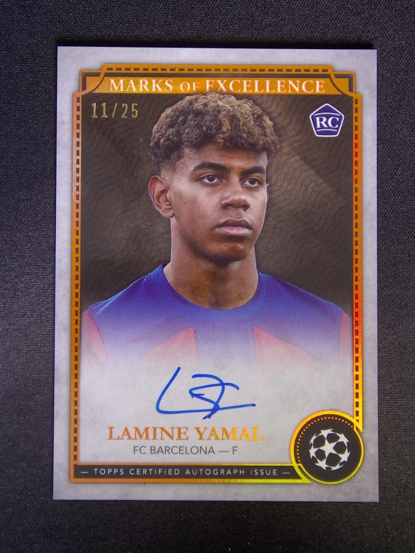 2023-24 Topps UEFA Lamine Yamal RC Marks Of Excellence Auto Orange Refractor /25