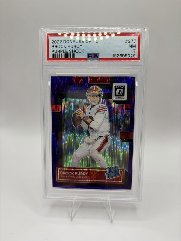 Brock Purdy Optic Rated Rookie Purple Shock Prizm  49ers NFL PSA 7