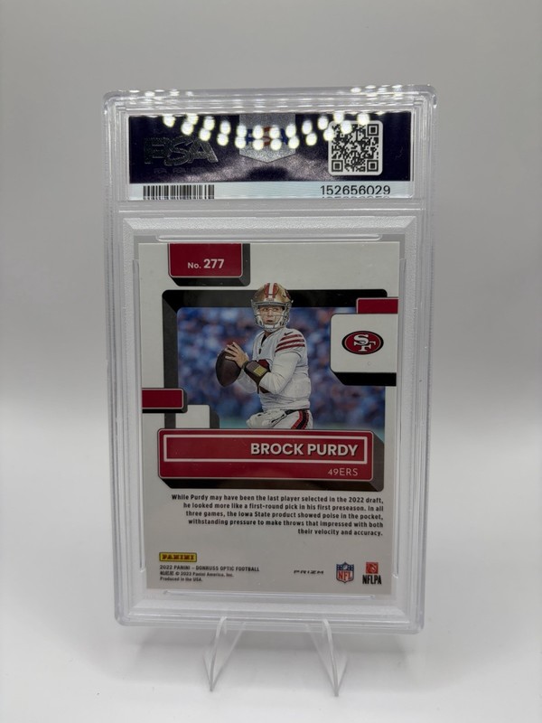 Brock Purdy Optic Rated Rookie Purple Shock Prizm  49ers NFL PSA 7 view 2