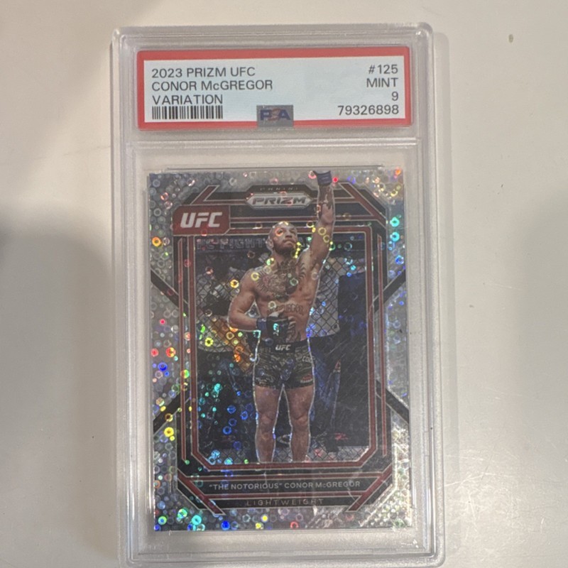 Panini 2023 Prizm UFC Conor McGregor #125 Variation Under Card Prizm PSA 9