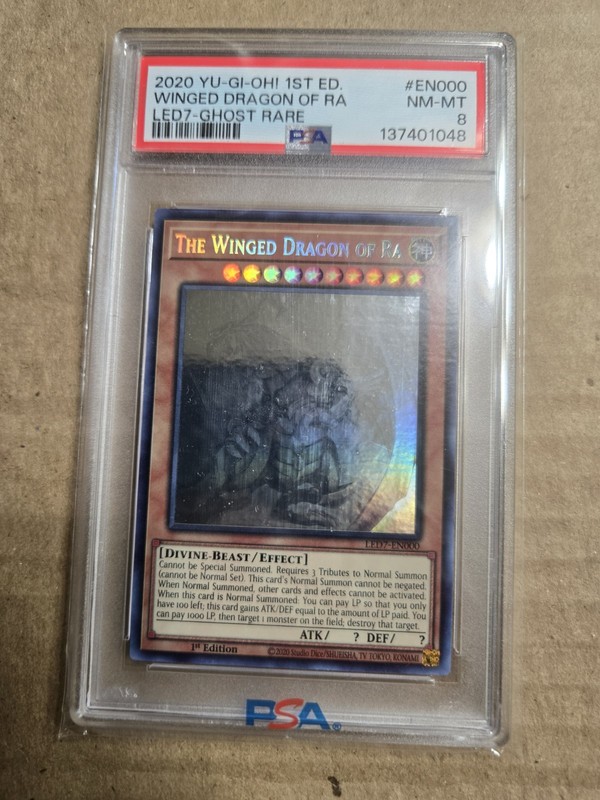 Yugioh The Winged Dragon of Ra LED7-EN000 1st Edition Ghost Rare PSA 8 NM-MT