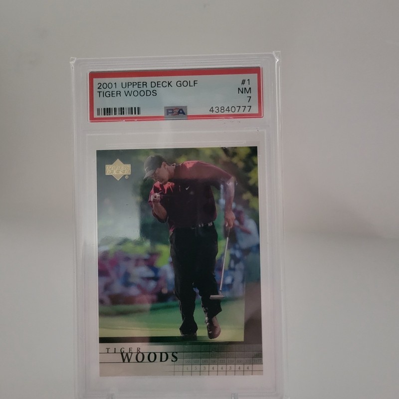 2001 Upper Deck Tiger Woods RC #1 PSA7