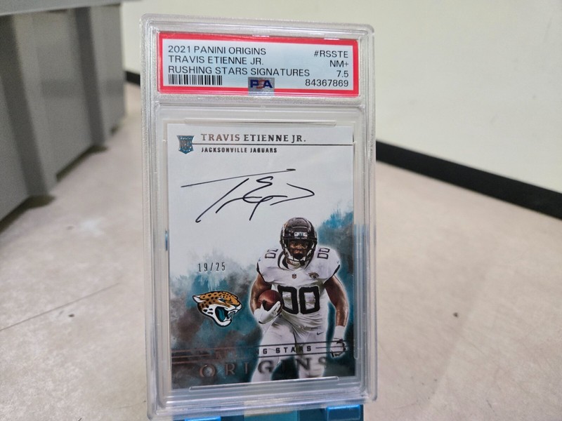2021 Panini Origins TRAVIS ETIENNE Rushing Stars Auto /25 PSA 7.5