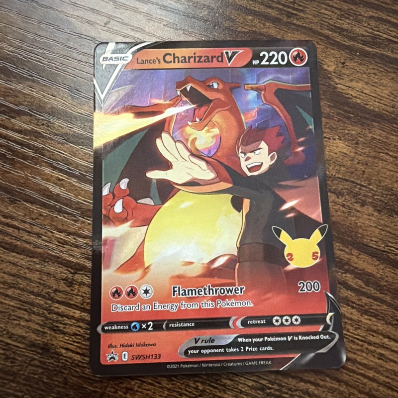 Pokémon TCG Lance's Charizard v SWSH133 Celebrations Black Star Promo Holo