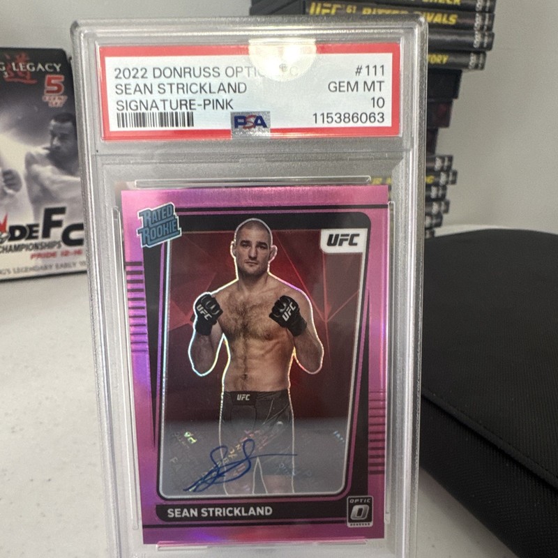 Panini 2022 Donruss Optic UFC Sean Strickland Rated Rookie #111 Pink Auto PSA 10