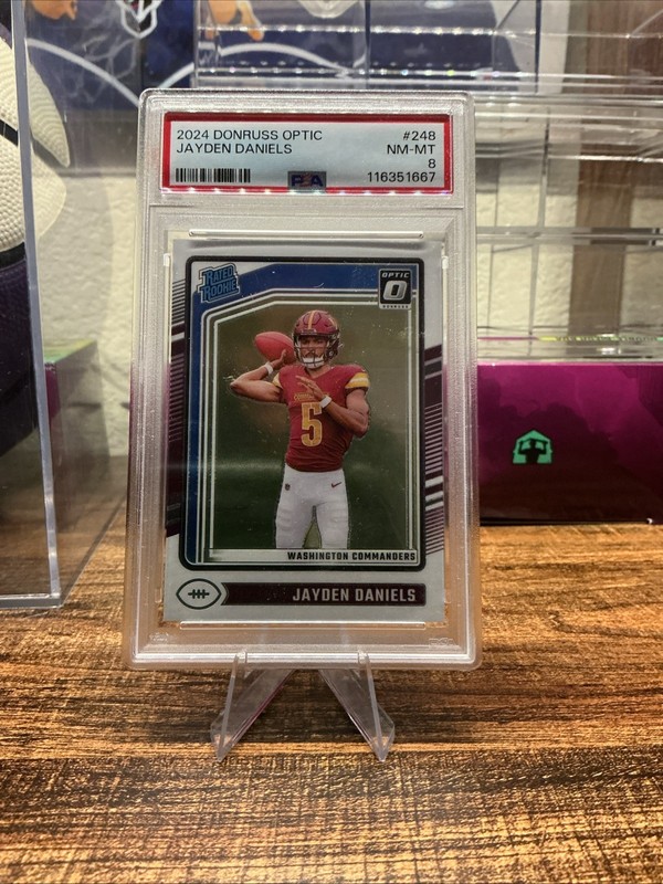 2024 PANINI DONRUSS OPTIC #248 JAYDEN DANIELS ROOKIE RC PSA 8