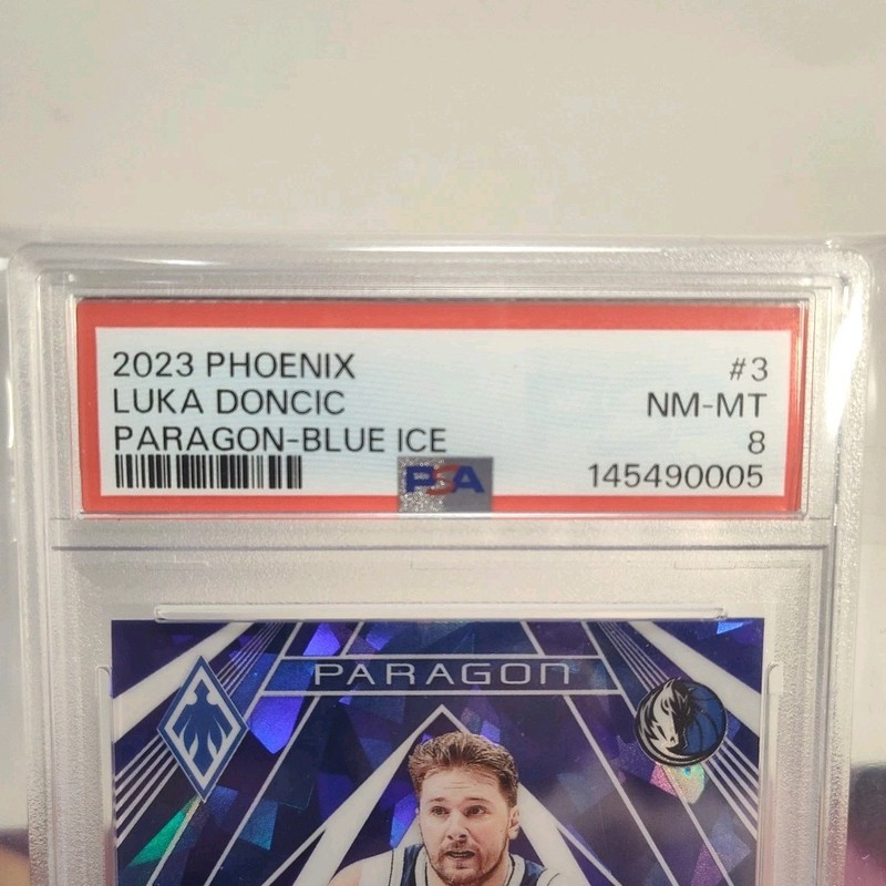 2023 Panini Phoenix Paragon Luka Doncic #3 Blue Ice Maverick PSA 8 view 2