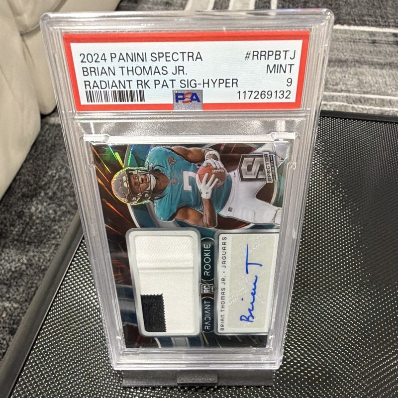 Panini 2024 Spectra Brian Thomas Jr. RC Patch Auto Hyper RRP-BTJ PSA 9 Jags