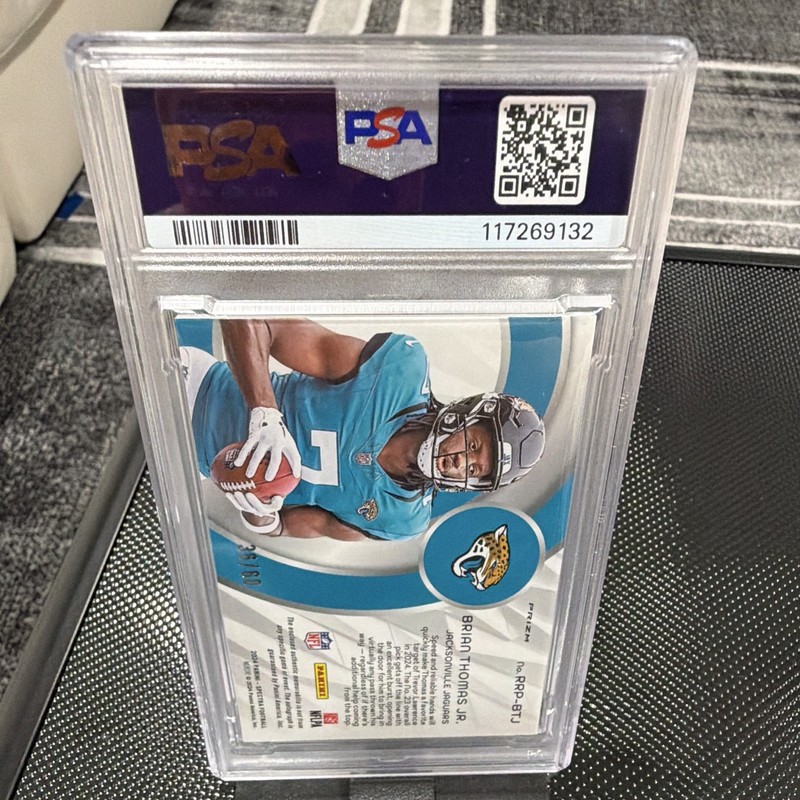 Panini 2024 Spectra Brian Thomas Jr. RC Patch Auto Hyper RRP-BTJ PSA 9 Jags view 2