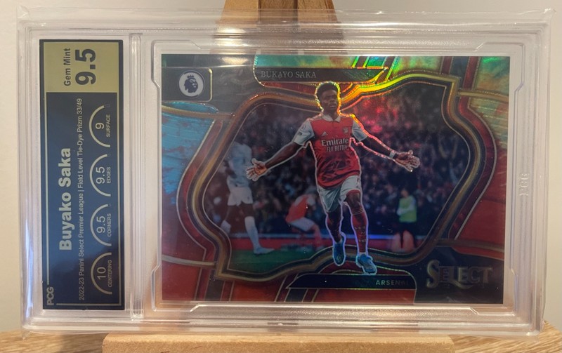 Bukayo Saka Tie-Dye Prizm. 33/49 PCG grading 9.5