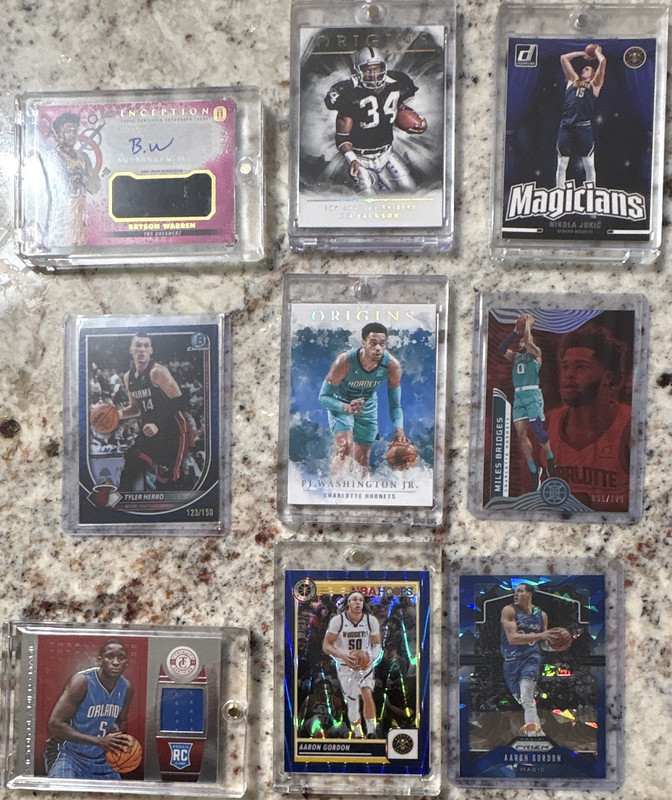 Basketball/Football 9 card lot: Auto, numbered, patch, insert, variation, rc