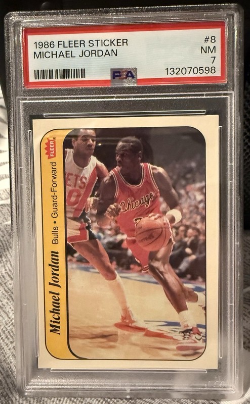 1986-87 Fleer - Stickers Michael Jordan #8 (RC) - PSA 7