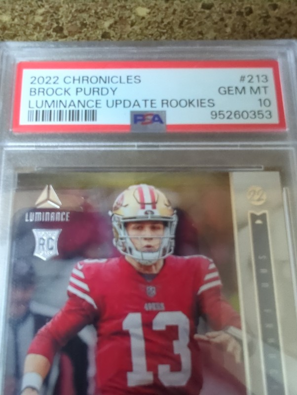 2022 Panini Chronicles - Luminance Update Rookies Brock Purdy PSA 10 view 2