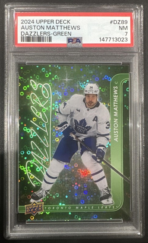2024-25 Upper Deck Auston Matthews #DZ-89 Dazzlers Green Maple Leafs PSA 7 view 1